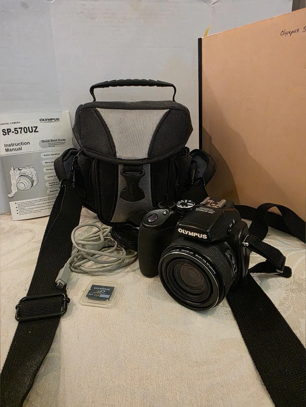 Olympus SP-57OUz 10MP CCD AA Battery Digital Camera/Strap& Lens Cap/ Case